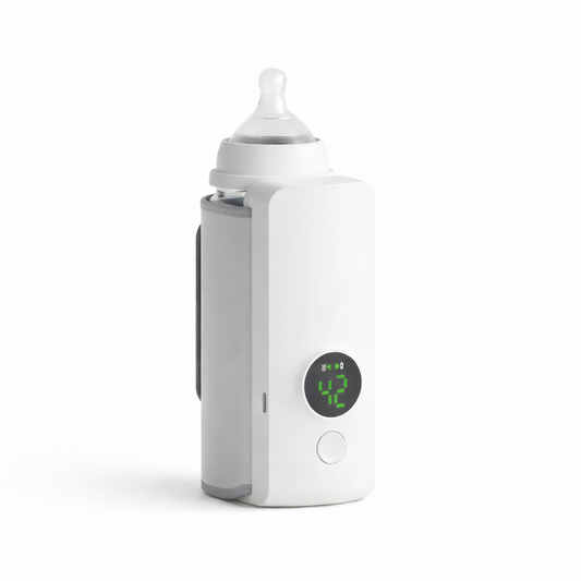 Loriava taşınabilir biberon ısıtıcısı, dijital sıcaklık ekranlı beyaz cihaz ve biberon.